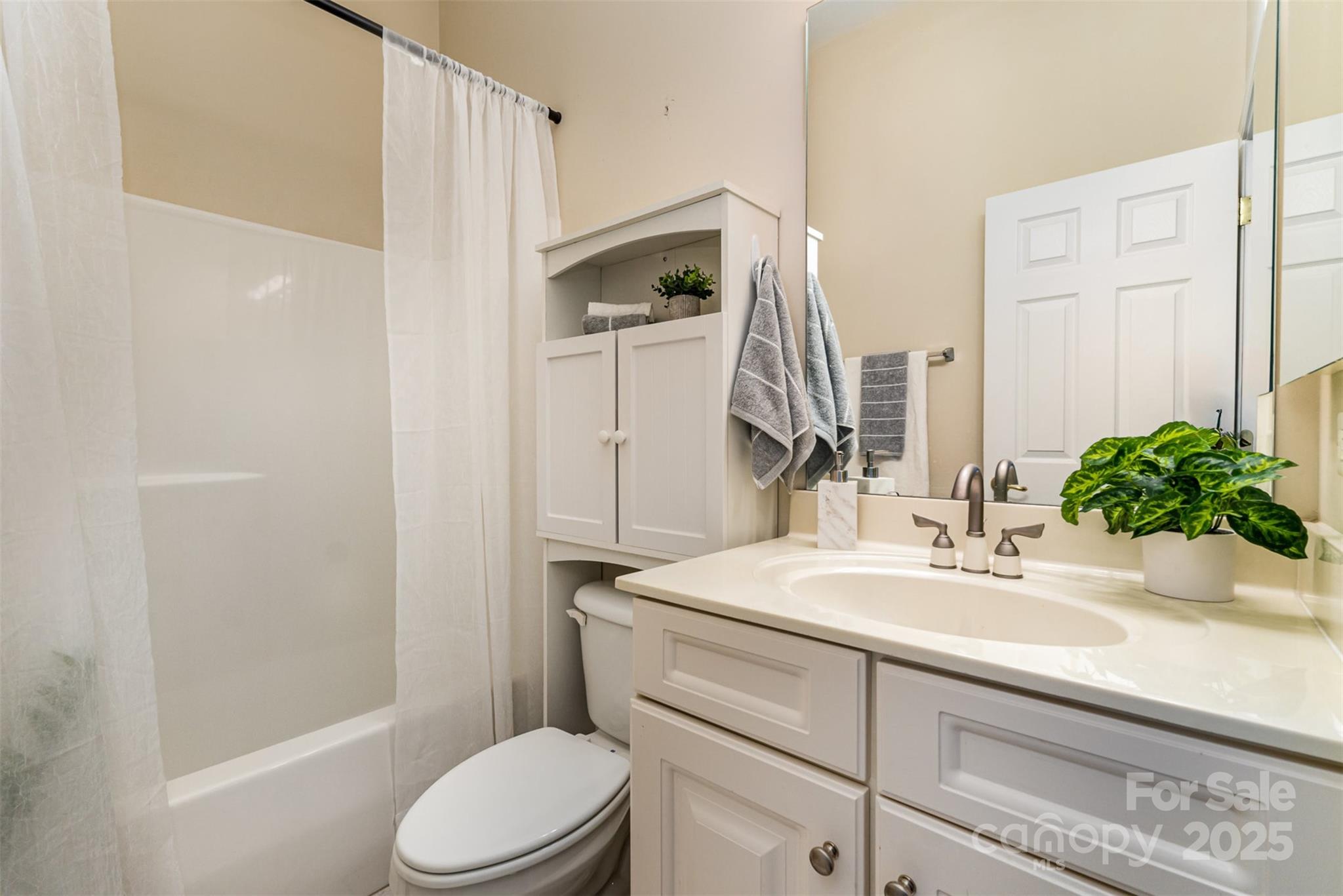 418 Garnet Court Fort Mill, SC 29708 - Photo 20 of 29 a bathroom with a sink toilet and shower