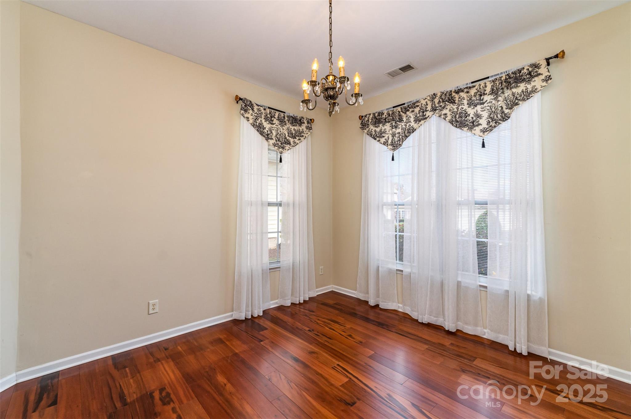 418 Garnet Court Fort Mill, SC 29708 - Photo 21 of 29 a view of a chandelier in an empty room