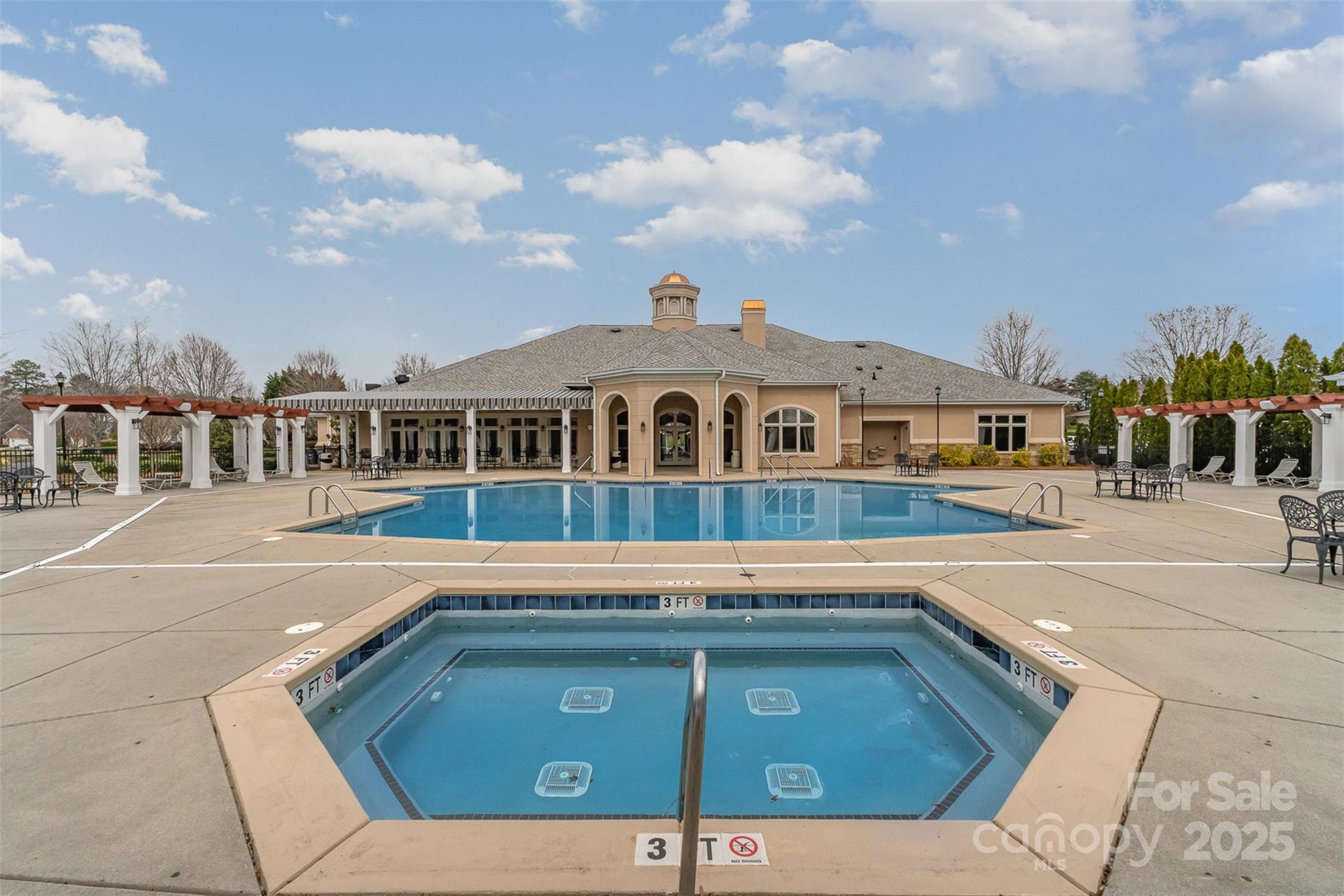 418 Garnet Court Fort Mill, SC 29708 - Photo 25 of 29 a view of pool with lawn chairs and iron fence