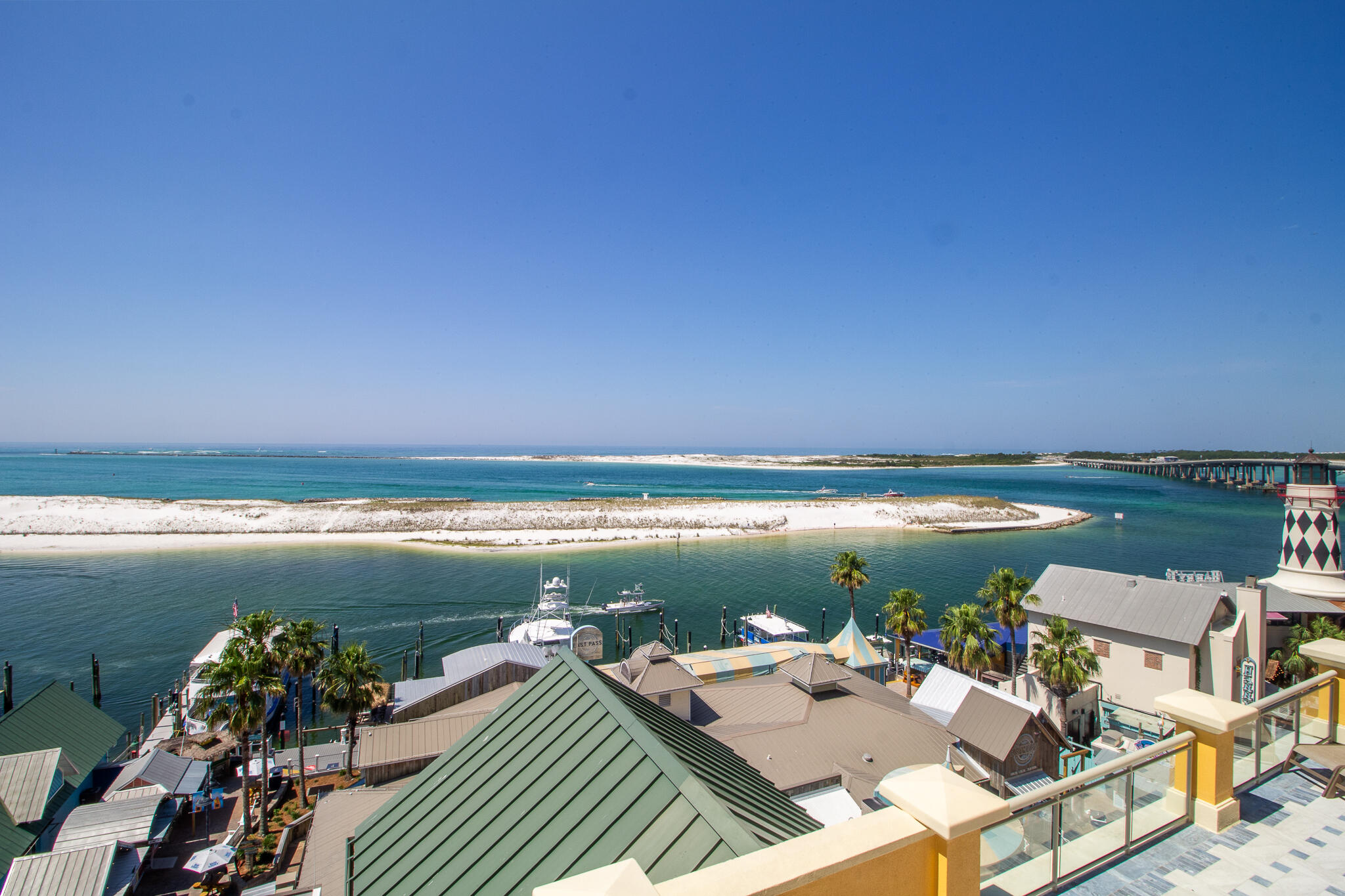 10 Harbor Boulevard, Unit E205E Destin, FL 32541 - Photo 7 of 31 a view of a terrace with chair and table
