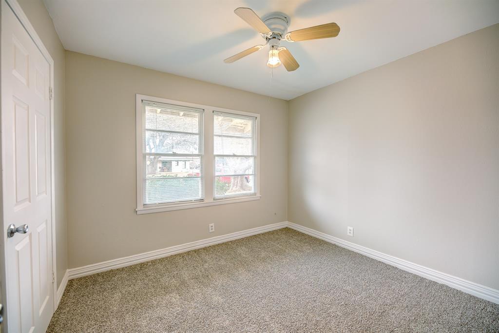 3635 Rogene Street North Richland Hills, TX 76180 - Photo 14 of 25 an empty room with a window and a fan