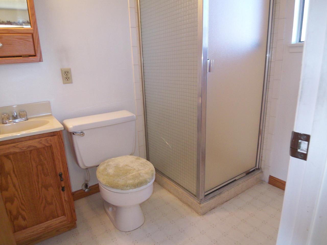3773 Alma Avenue Redding, CA 96002 - Photo 8 of 12 a bathroom with a toilet and a sink
