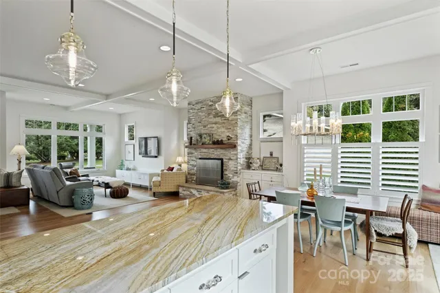 a very nice looking living room with a large window