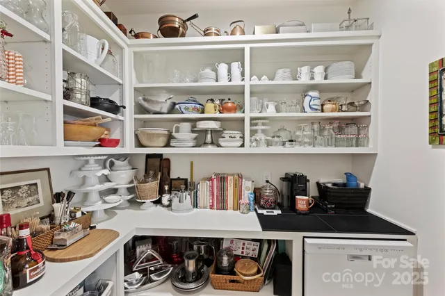 a kitchen with a table and a stove
