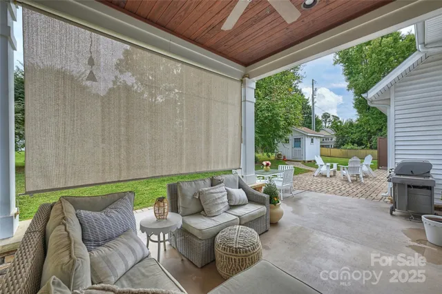a outdoor living space with furniture and garden view