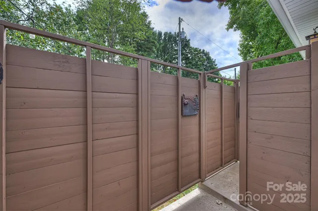 a bathroom with a shower and a sink