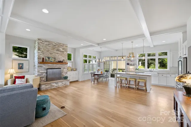a living room with furniture and a table