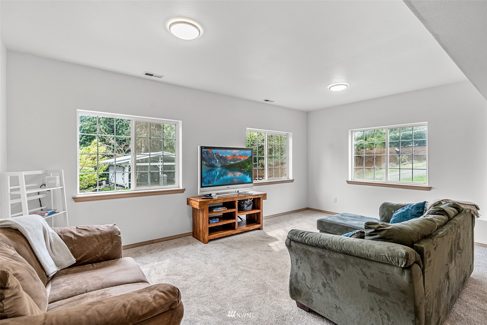19329 Winesap Road Bothell, WA 98012 - Photo 21 of 32 a living room with furniture and a window