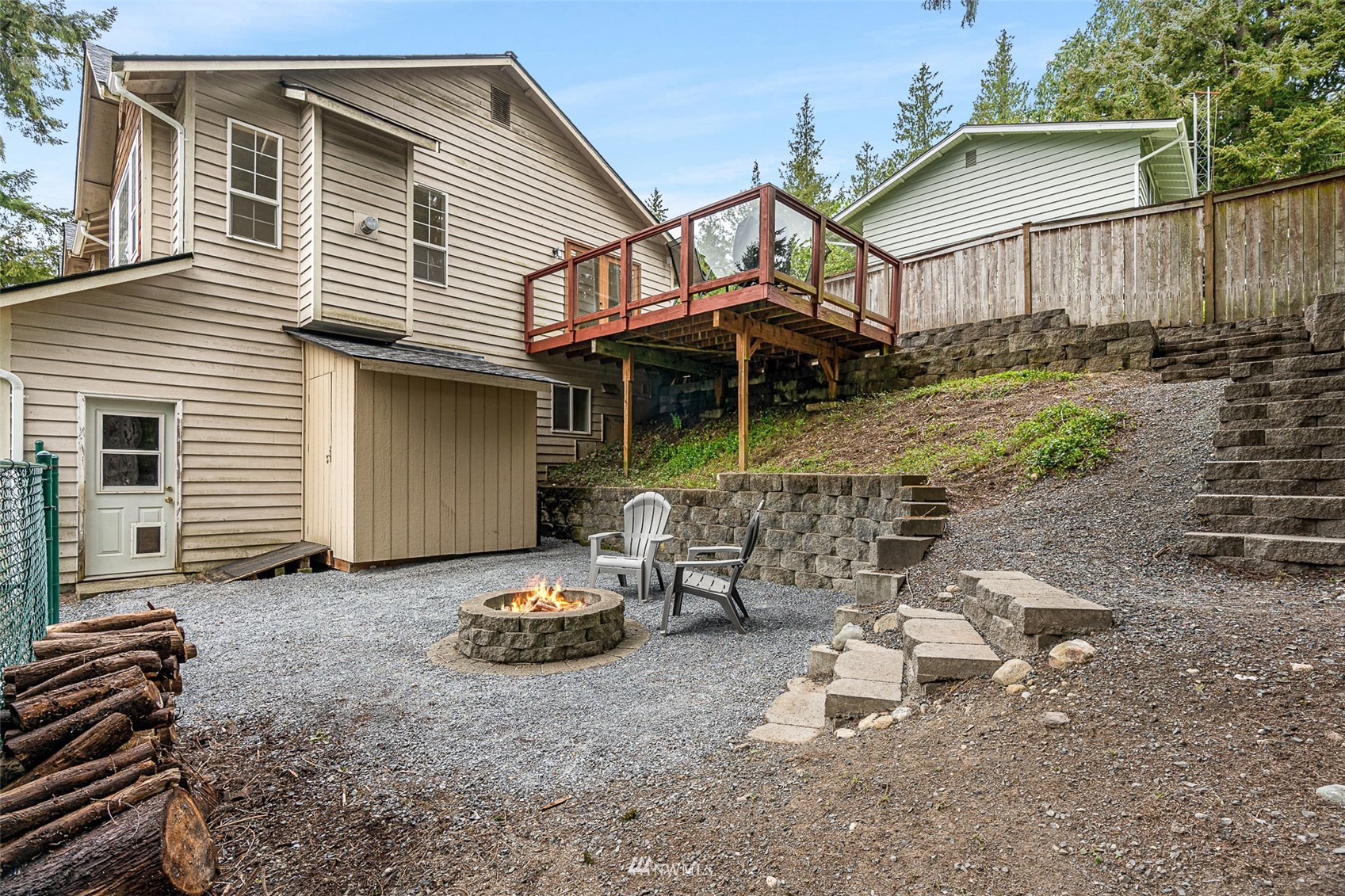 19329 Winesap Road Bothell, WA 98012 - Photo 28 of 32 a view of a backyard with sitting area