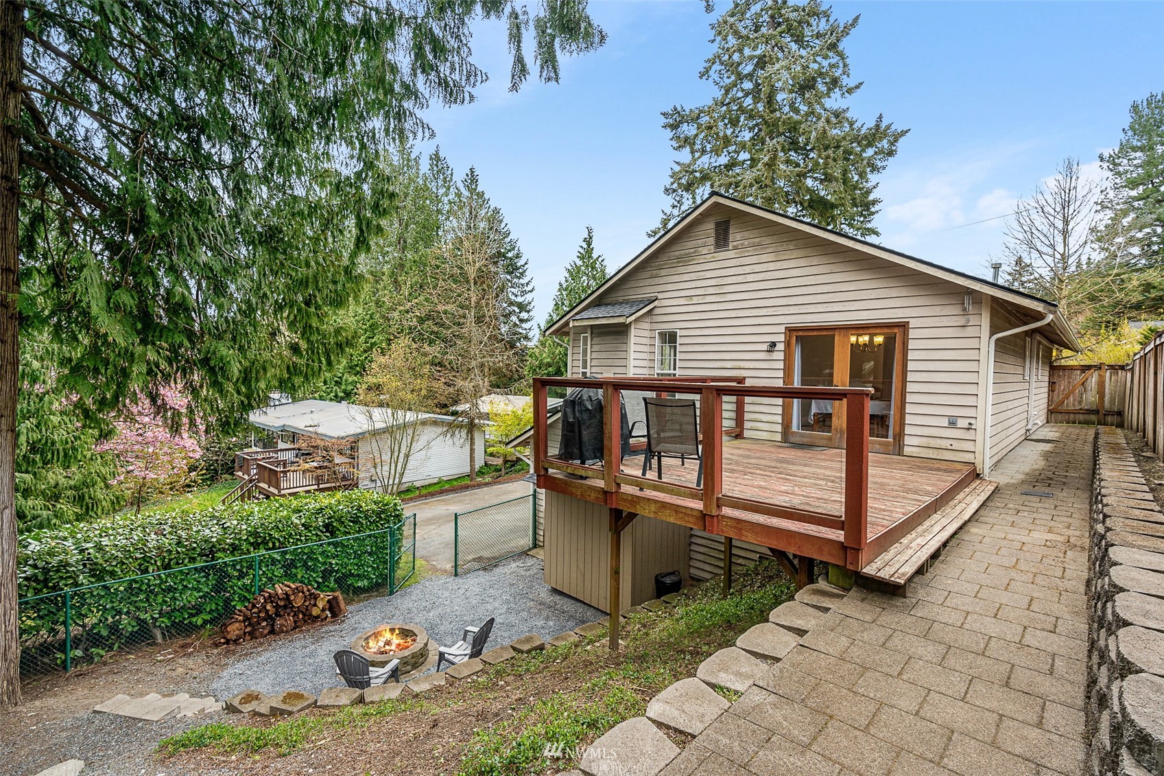 19329 Winesap Road Bothell, WA 98012 - Photo 29 of 32 a view of a house with a yard and wooden fence