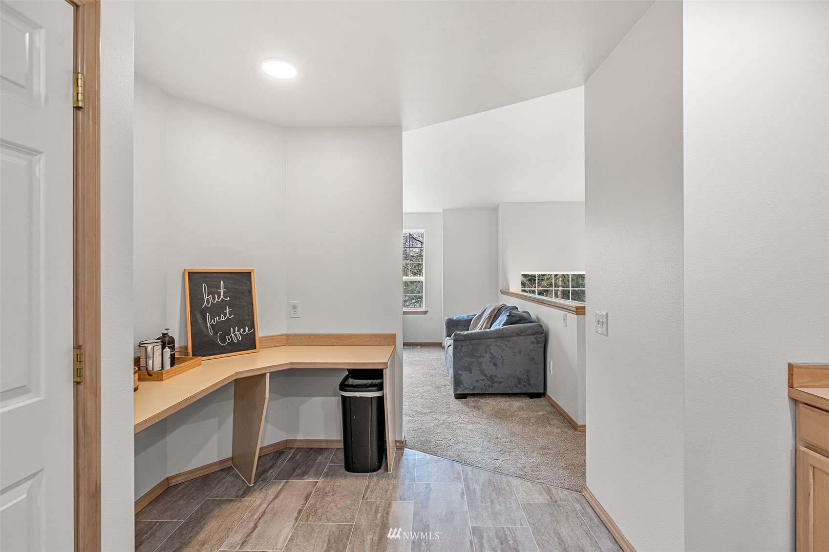 19329 Winesap Road Bothell, WA 98012 - Photo 8 of 32 a workspace with furniture and wooden floor