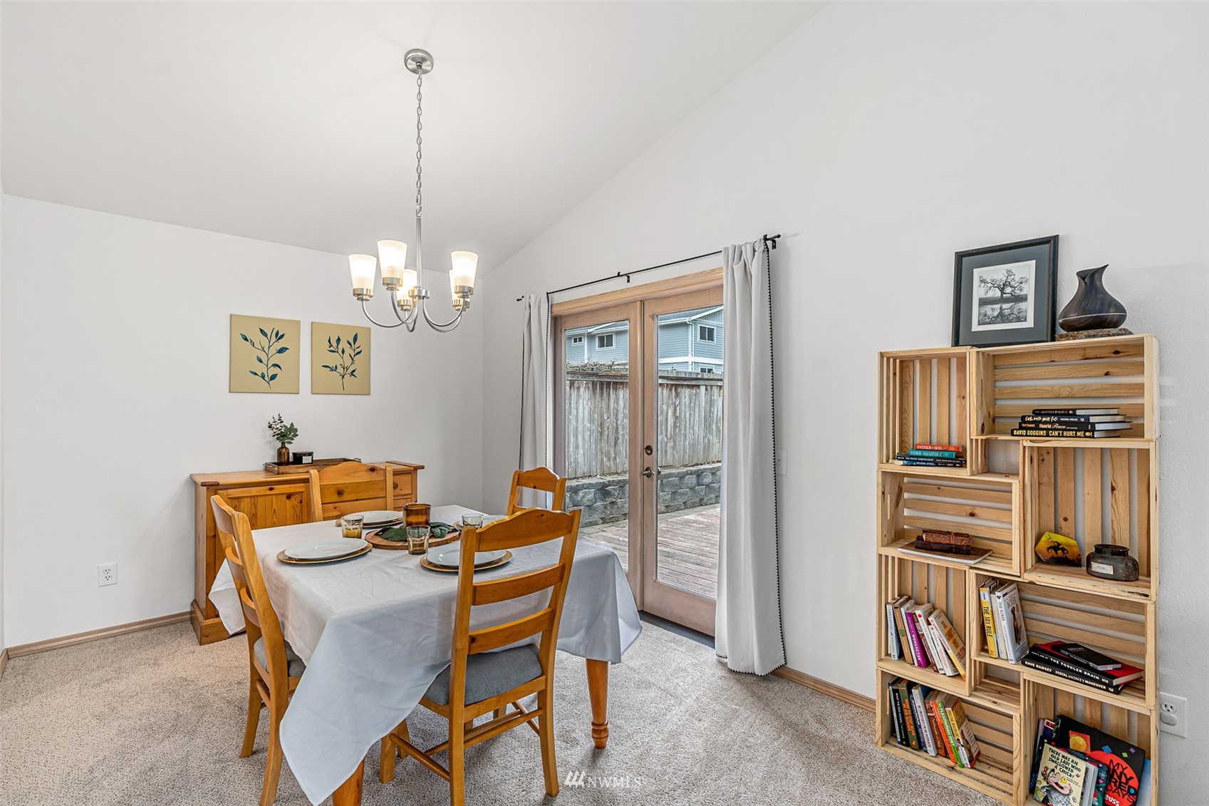 19329 Winesap Road Bothell, WA 98012 - Photo 9 of 32 a dining room with furniture and chandelier