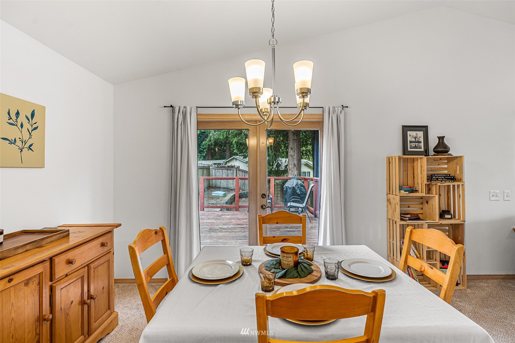 19329 Winesap Road Bothell, WA 98012 - Photo 10 of 32 a view of a dining room with furniture a rug and wooden floor