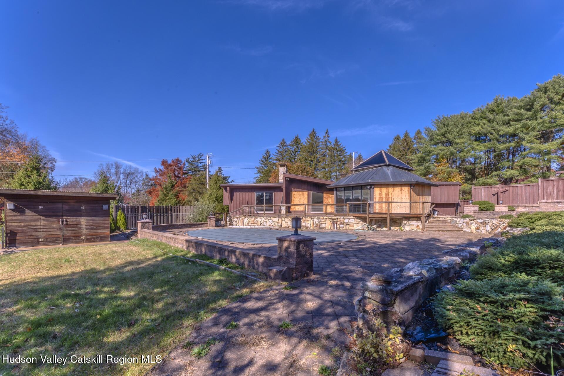32 Lynette Boulevard Kingston, NY 12401 - Photo 28 of 34 a view of a house with a yard and sitting area