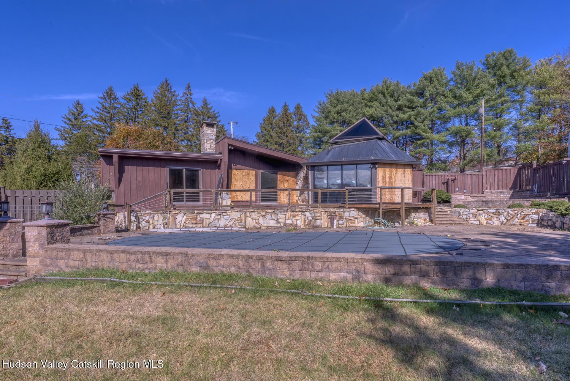 32 Lynette Boulevard Kingston, NY 12401 - Photo 3 of 34 a front view of a house with a yard