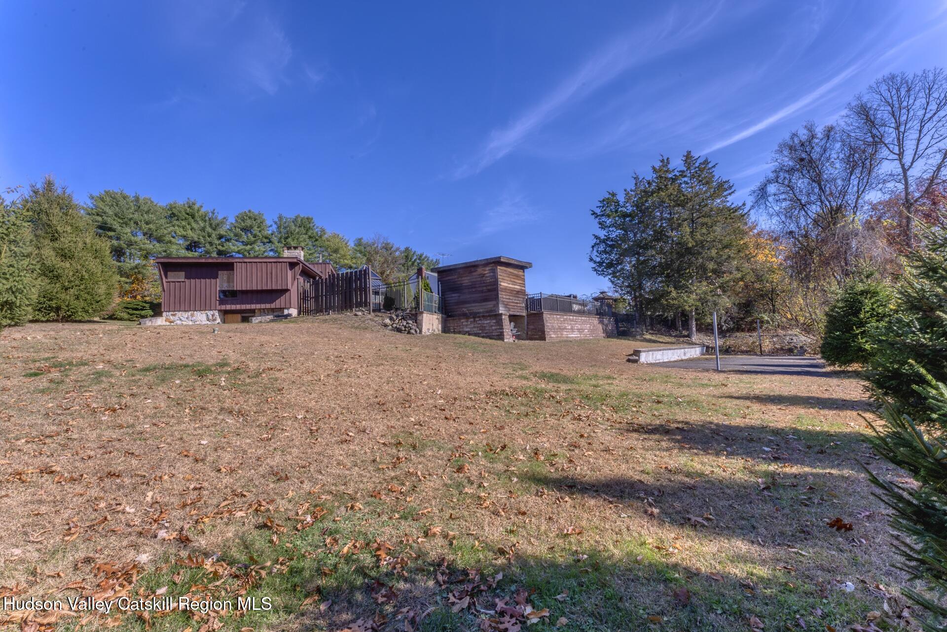 32 Lynette Boulevard Kingston, NY 12401 - Photo 6 of 34 a backyard of a house with table and chairs