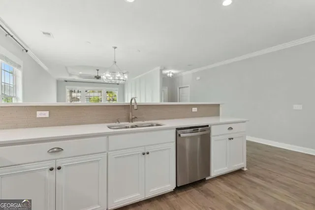 a white bath tub sitting next to a shower