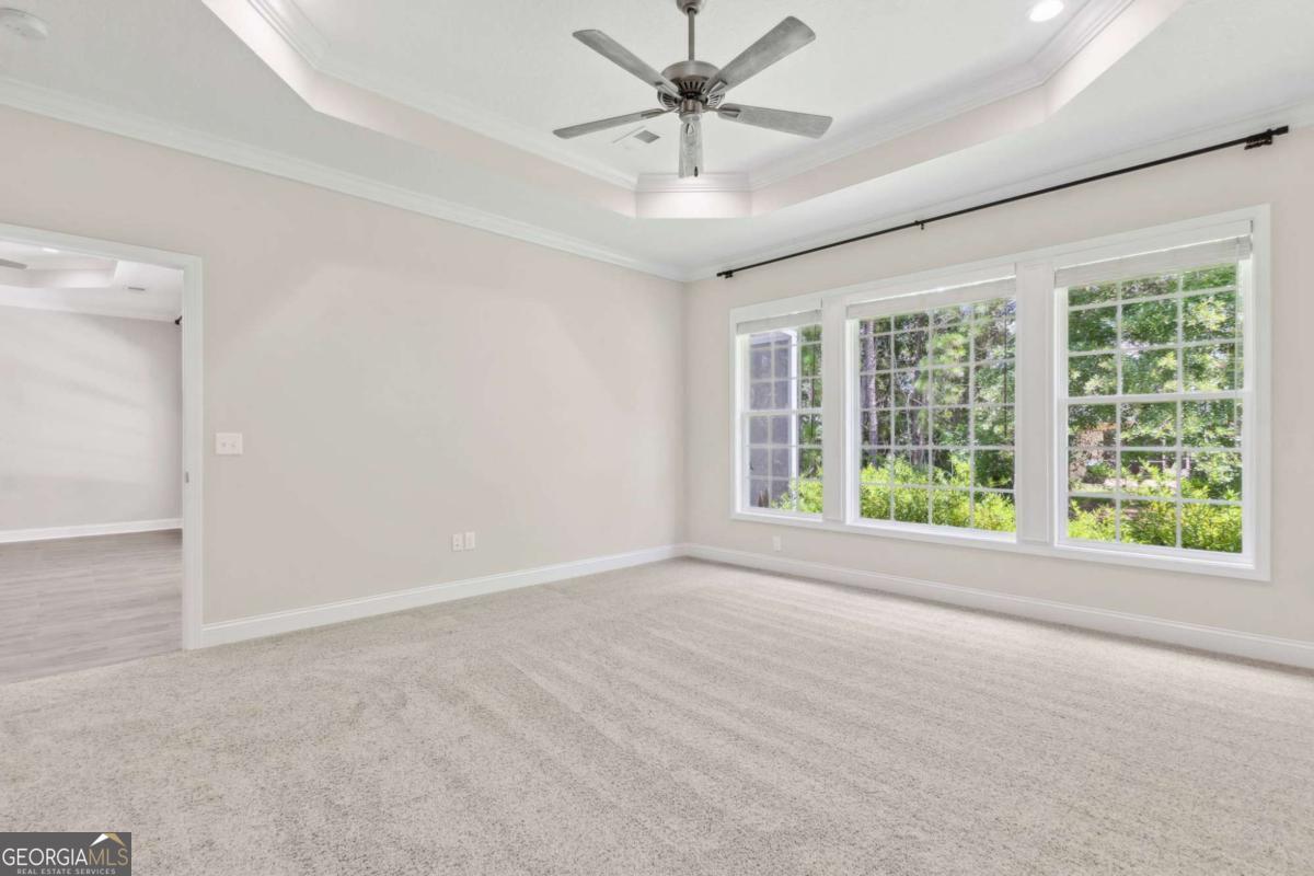 107 Amanda Trace Kingsland, GA 31548 - Photo 30 of 94 a view of an empty room with a window
