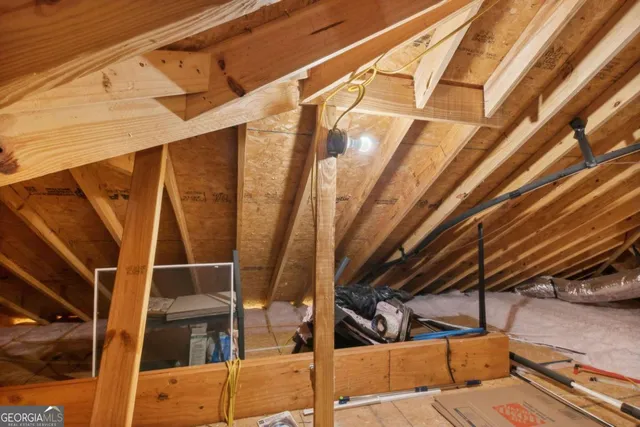a view of a house with swimming pool and sitting area