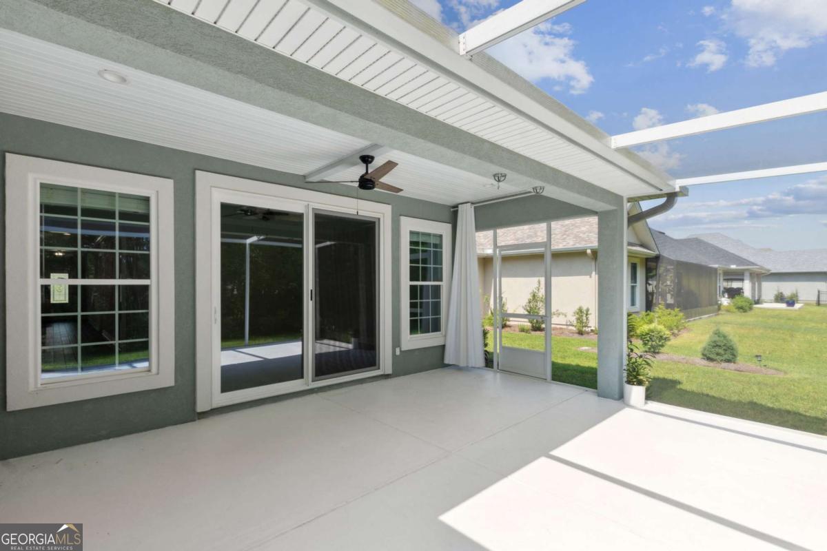 107 Amanda Trace Kingsland, GA 31548 - Photo 40 of 94 a view of a entrance door of the building