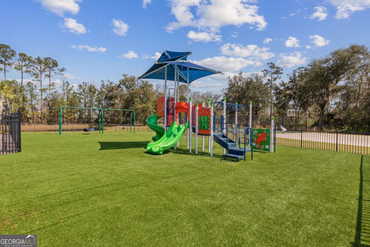 107 Amanda Trace Kingsland, GA 31548 - Photo 63 of 94 a view of a playground with a slide
