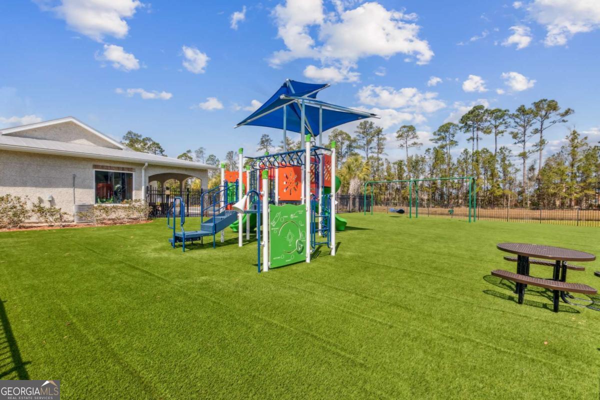 107 Amanda Trace Kingsland, GA 31548 - Photo 65 of 94 a view of a house with a yard