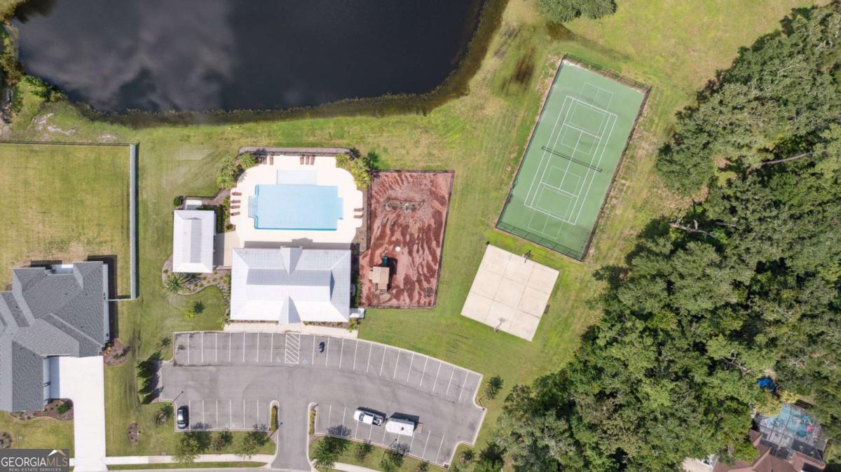 107 Amanda Trace Kingsland, GA 31548 - Photo 81 of 94 an aerial view of a house with a yard and fountain in front of it