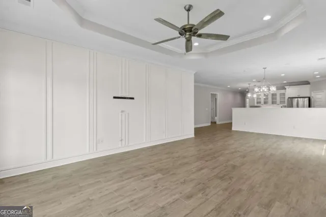 a kitchen with stainless steel appliances a refrigerator stove and microwave