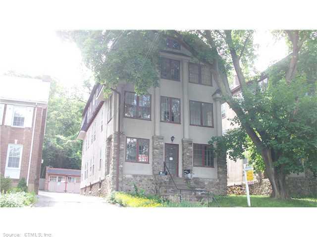 139 Grandview Avenue Waterbury, CT 06708 - Photo 1 of 1 a black and white photo of a house