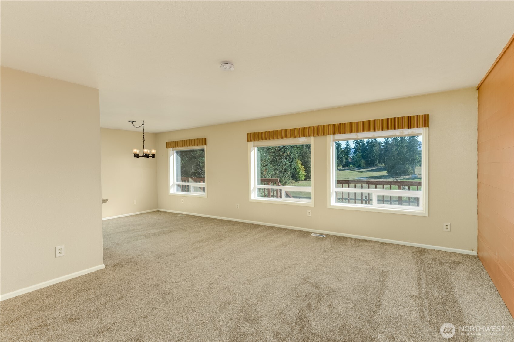 103 Turnagain Place Sequim, WA 98382 - Photo 18 of 40 an empty room with a window