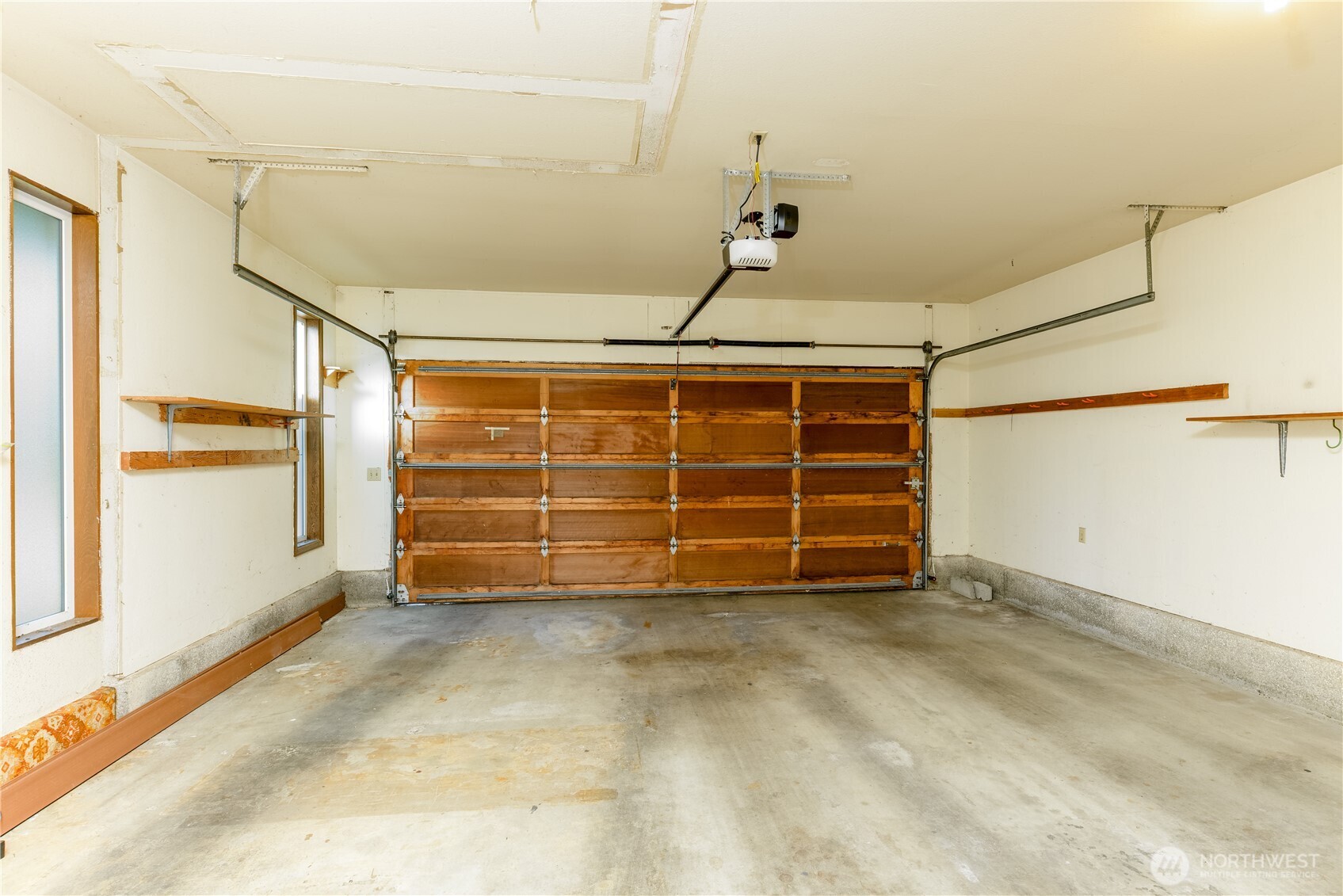 103 Turnagain Place Sequim, WA 98382 - Photo 31 of 40 a view of an empty room with a window