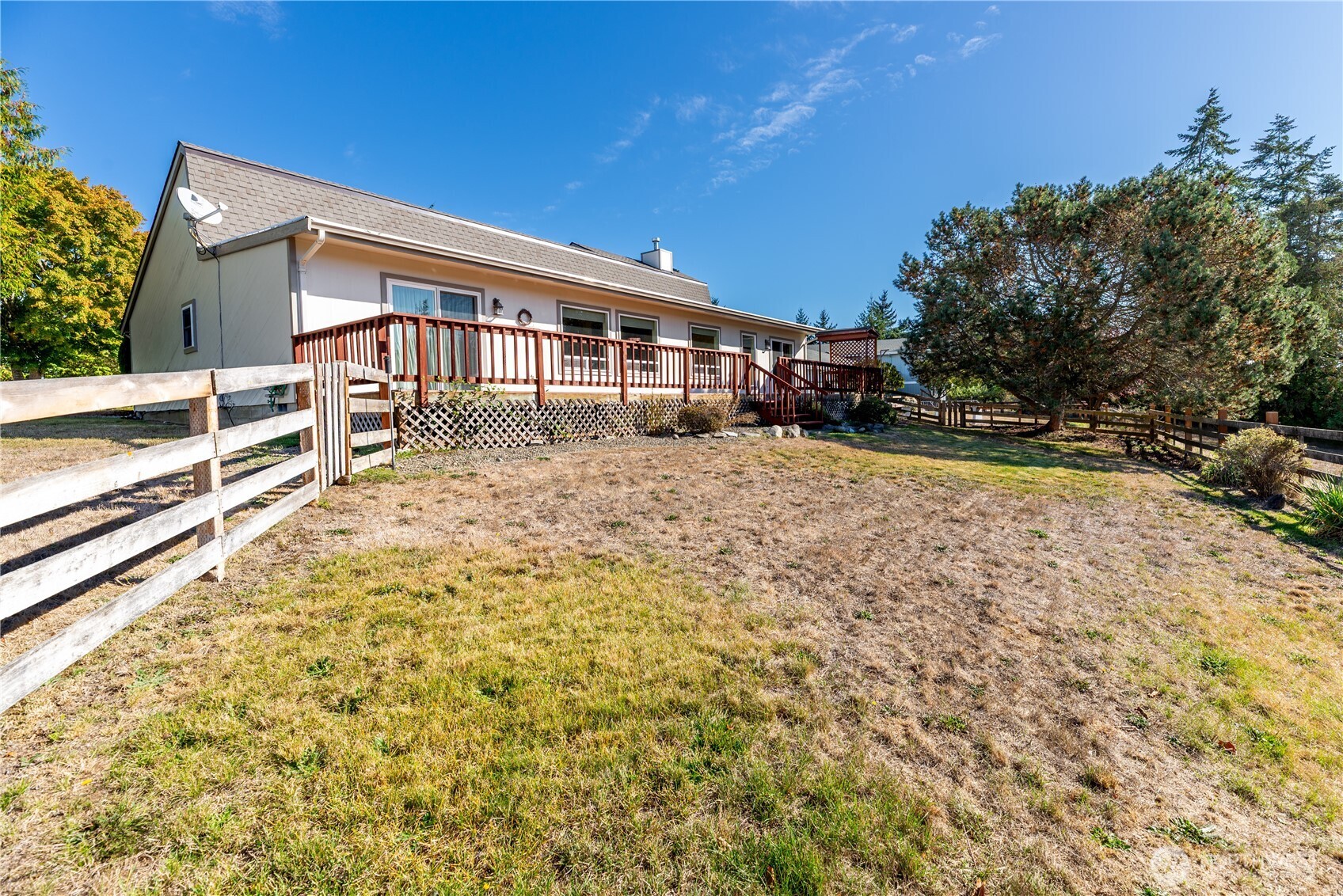 103 Turnagain Place Sequim, WA 98382 - Photo 37 of 40 a view of a house with a yard