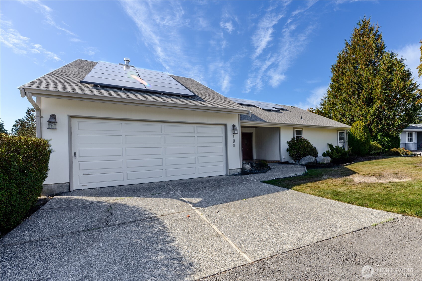 103 Turnagain Place Sequim, WA 98382 - Photo 39 of 40 a view of a house with a yard and garage