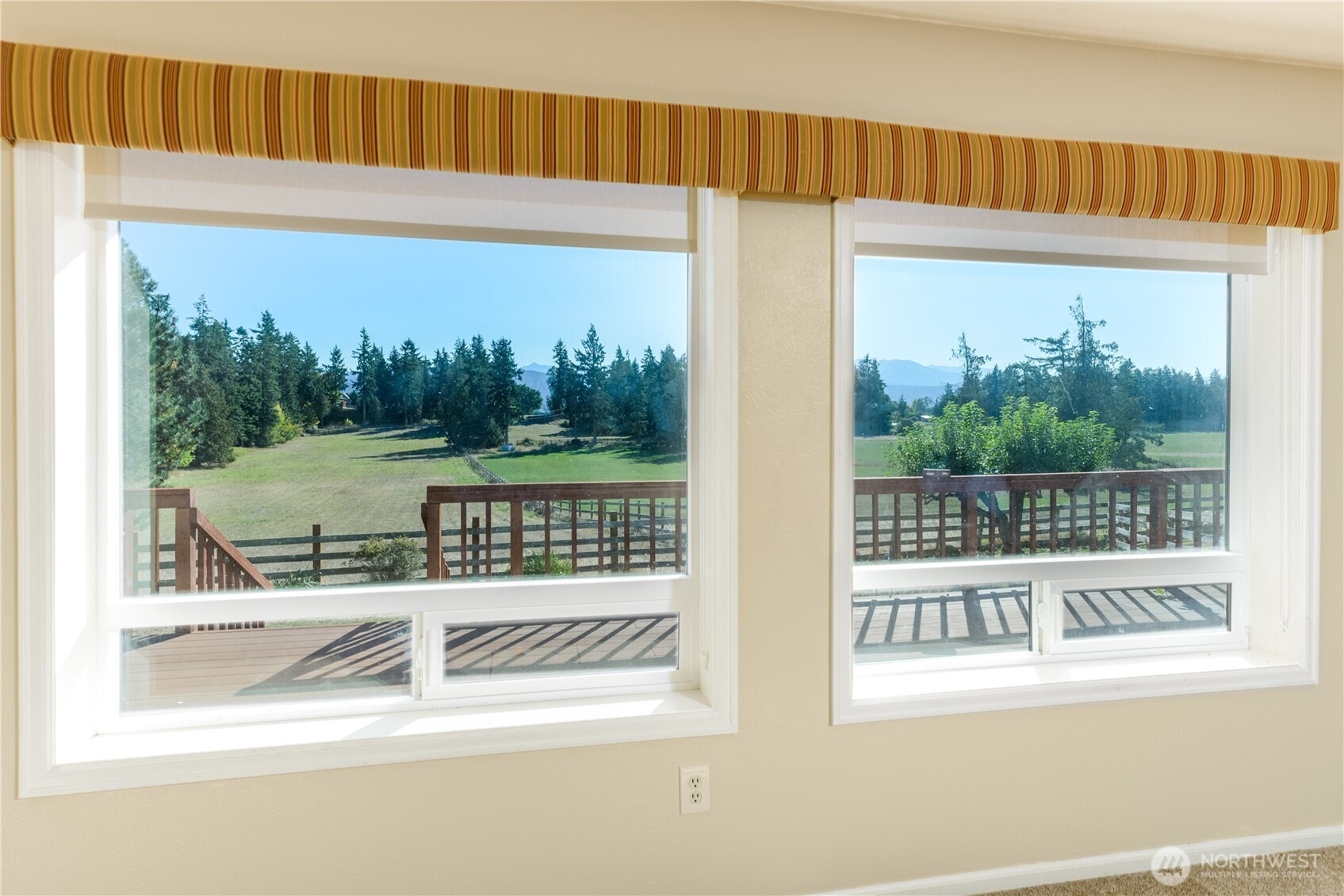 103 Turnagain Place Sequim, WA 98382 - Photo 6 of 40 a view of a porch and a yard