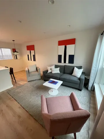 a living room with furniture and a couch