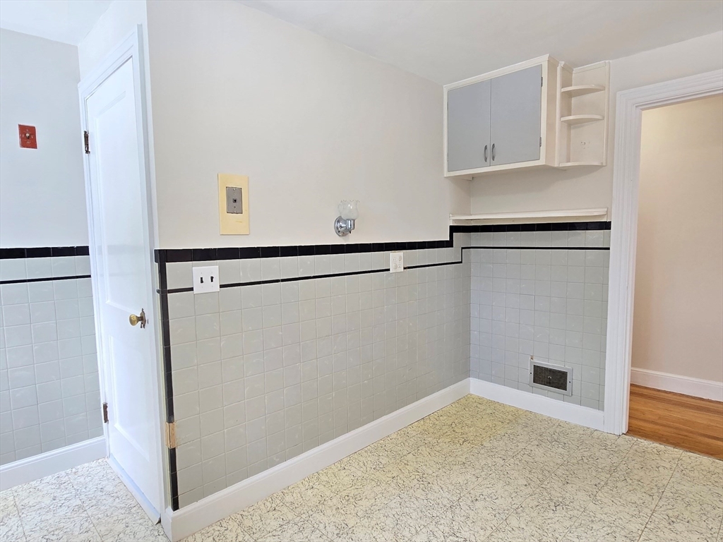 37 Riverview Drive Ashland, MA 01721 - Photo 17 of 30 a view of a storage & utility room with washer and dryer
