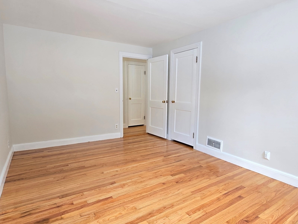 37 Riverview Drive Ashland, MA 01721 - Photo 20 of 30 a view of an empty room with wooden floor
