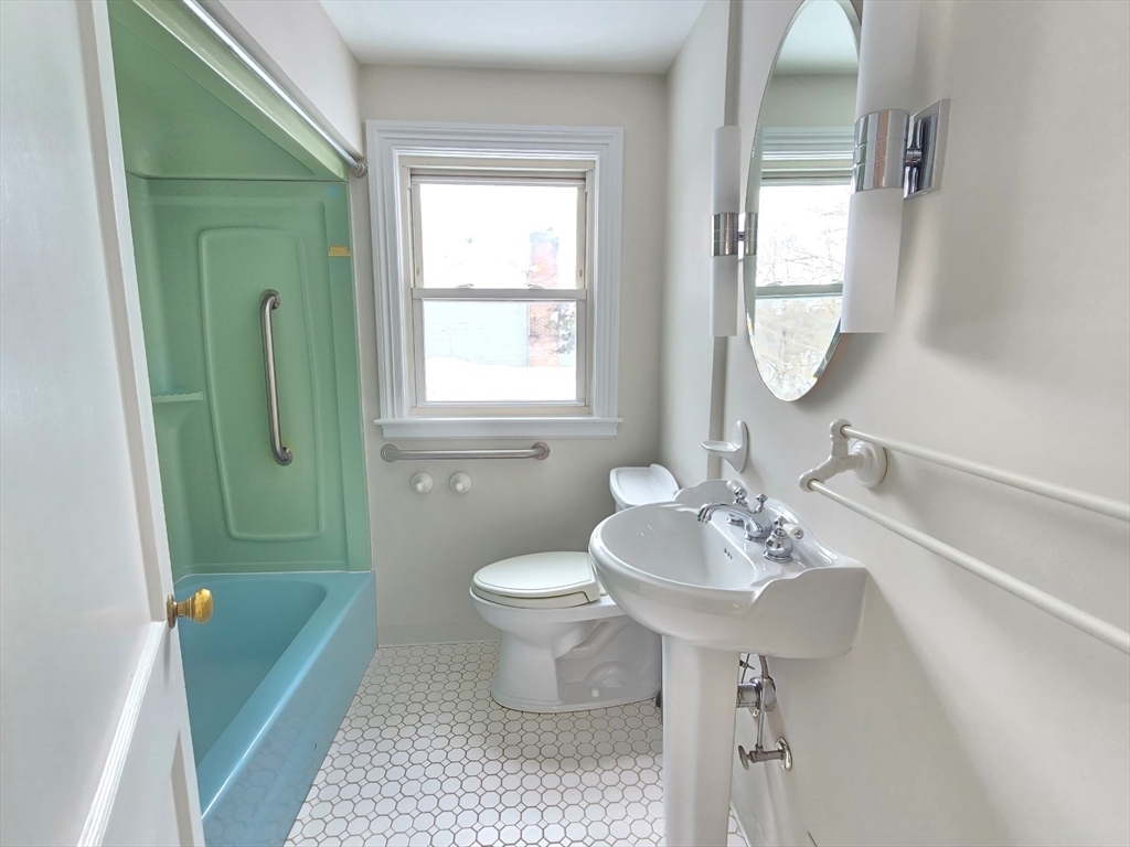 37 Riverview Drive Ashland, MA 01721 - Photo 24 of 30 a bathroom with a sink toilet and a mirror