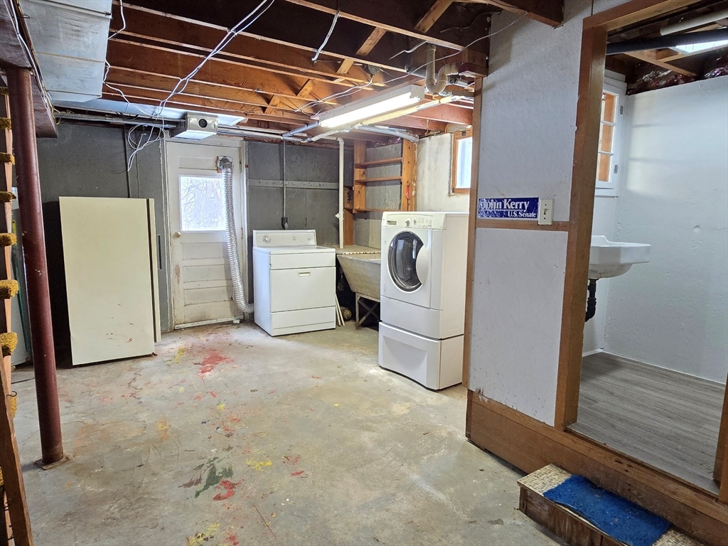 37 Riverview Drive Ashland, MA 01721 - Photo 28 of 30 a utility room with dryer and washer
