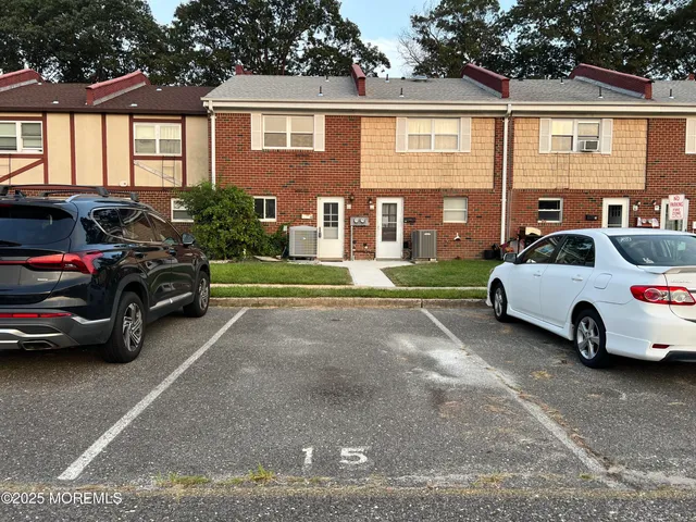a view of a car in front of a house
