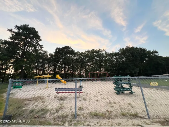 a view of a park with a slide
