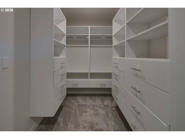 a view of an empty walk in closet