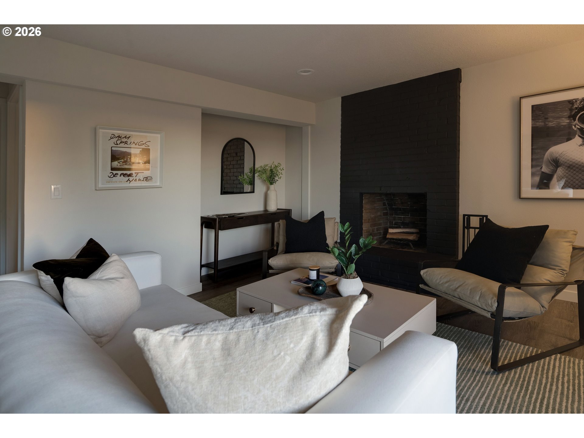 6409 Northwest 202nd Circle Ridgefield, WA 98642 - Photo 21 of 39 a living room with furniture and a fireplace