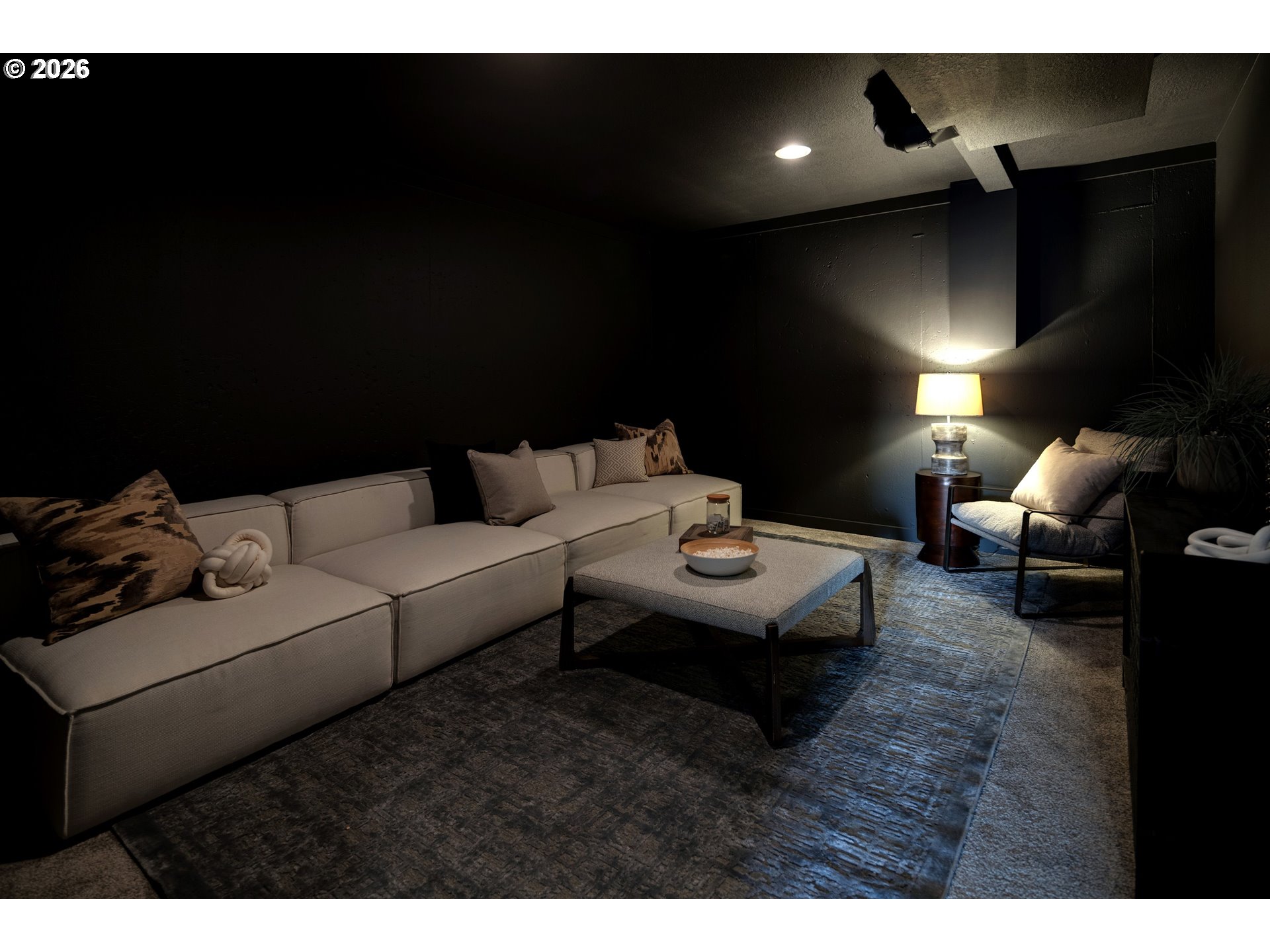 6409 Northwest 202nd Circle Ridgefield, WA 98642 - Photo 22 of 39 a living room with furniture and a flat screen tv