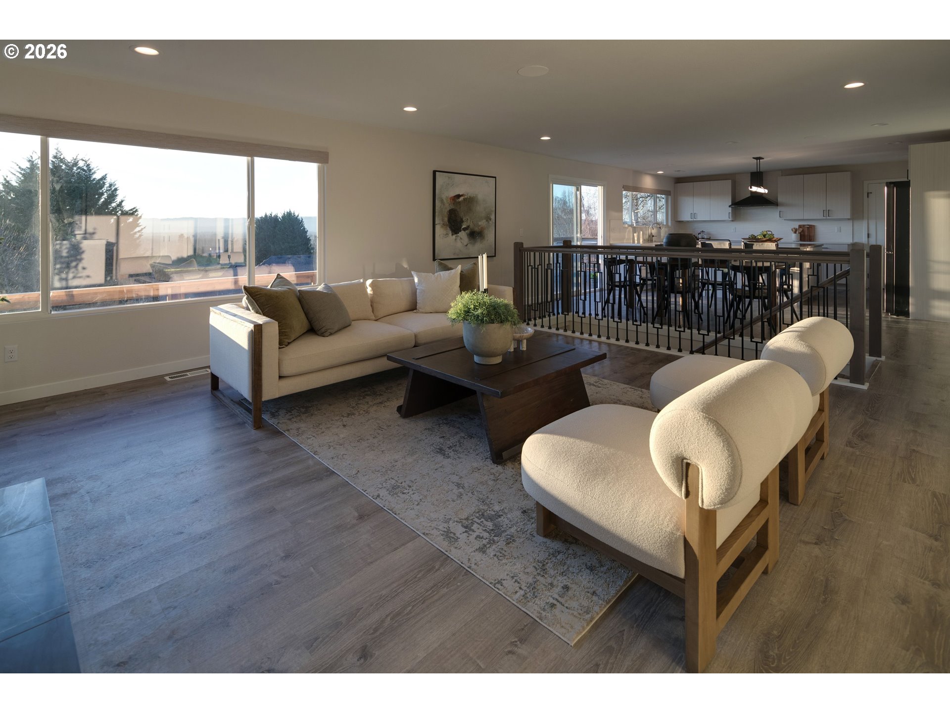 6409 Northwest 202nd Circle Ridgefield, WA 98642 - Photo 10 of 39 a living room with furniture and a large window
