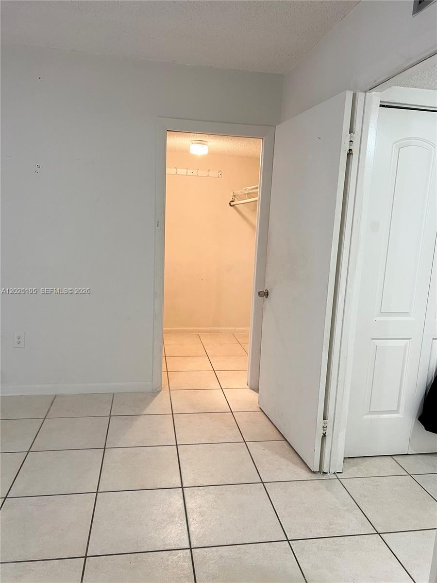 8400 Southwest 133rd Avenue Road, Unit 121 Miami, FL 33183 - Photo 35 of 43 a view of a livingroom with white doors