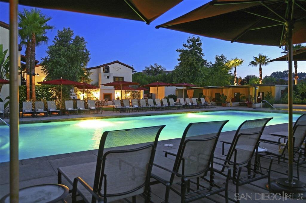 9660 Claiborne Square La Jolla, CA 92037 - Photo 22 of 23 a view of a chairs and table in the patio