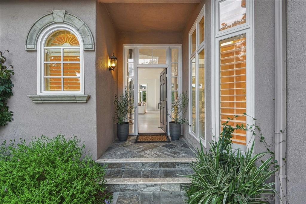 9660 Claiborne Square La Jolla, CA 92037 - Photo 4 of 23 a view of entrance door of the house