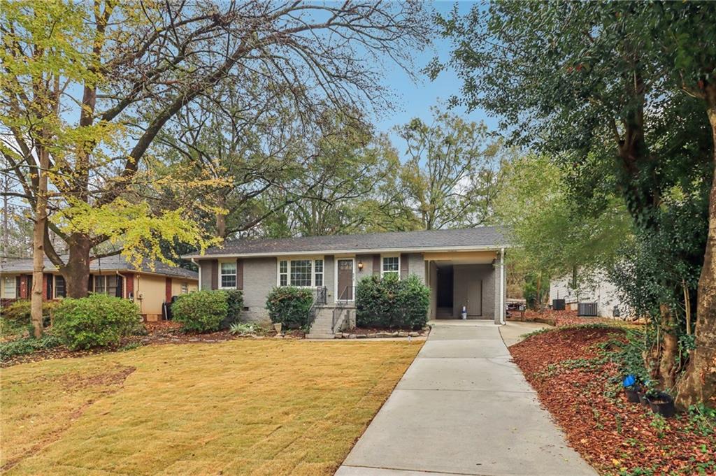 front view of a house with a yard