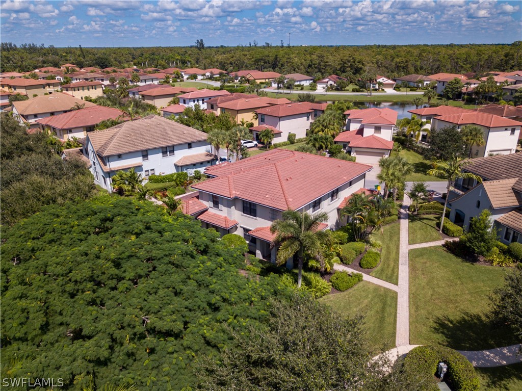 1387 Santiago Circle, Unit 802 Naples, FL 34113 - Photo 4 of 29 an aerial view of multiple house